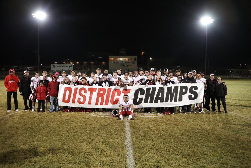 Team Photo with District Champs banner