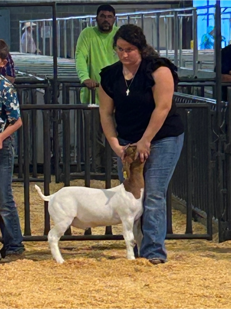 Brecklyn showing her goat 
